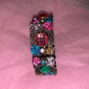Faux crystals and different colored flowers bracelet